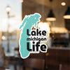 Sticker with turquoise outline of Michigan and text "Lake Michigan Life"