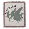 Woven throw blanket with Leech Lake Minnesota map design and fringed edges.