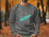 Grey sweatshirt with teal Lake Erie map and compass rose.
