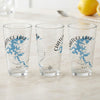 Three clear glasses with blue Chatuge Lake map designs and compass rose details.