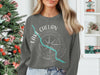 Gray sweatshirt featuring a compass rose with "Lake Chelan Washington" text and a turquoise river graphic.
