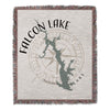Woven throw blanket with Falcon Lake map, compass, and "Texas" text.