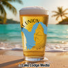 Glass of beer on a beach with "Lake Union" text and a blue Washington state outline.