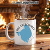 White mug with Lake Okeechobee map and text, steaming coffee, fireplace and Christmas tree.