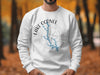 White sweatshirt with a compass graphic featuring Lake Oconee, Georgia.