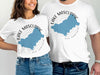 White t-shirts with blue Lake Mascuppic map and compass design, "New Hampshire" text.