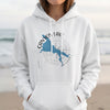 White hoodie with Canyon Lake Arizona map and compass graphic.