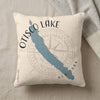 Otisco Lake New York map on textured cream pillow with compass design.