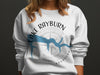 White sweatshirt with Lake Rayburn Arkansas compass and blue lake graphic.