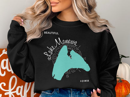 Black sweatshirt with "Beautiful Lake Manawa Iowa" map graphic.