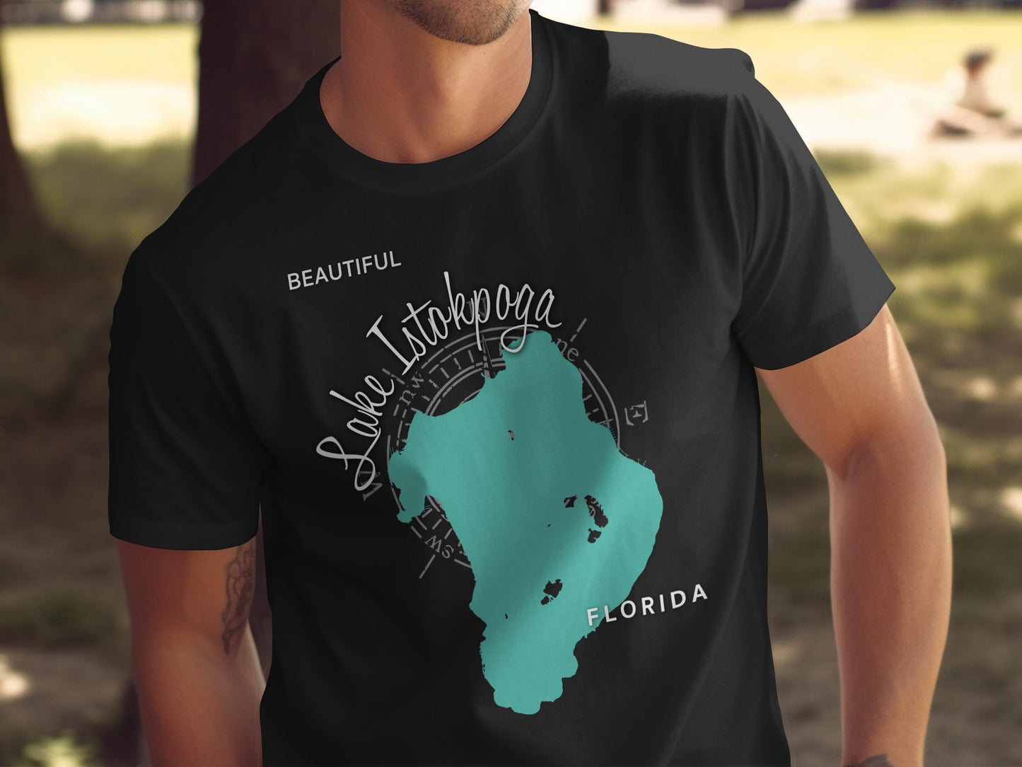 Black t-shirt with "Lake Istokpoga Florida" map graphic.