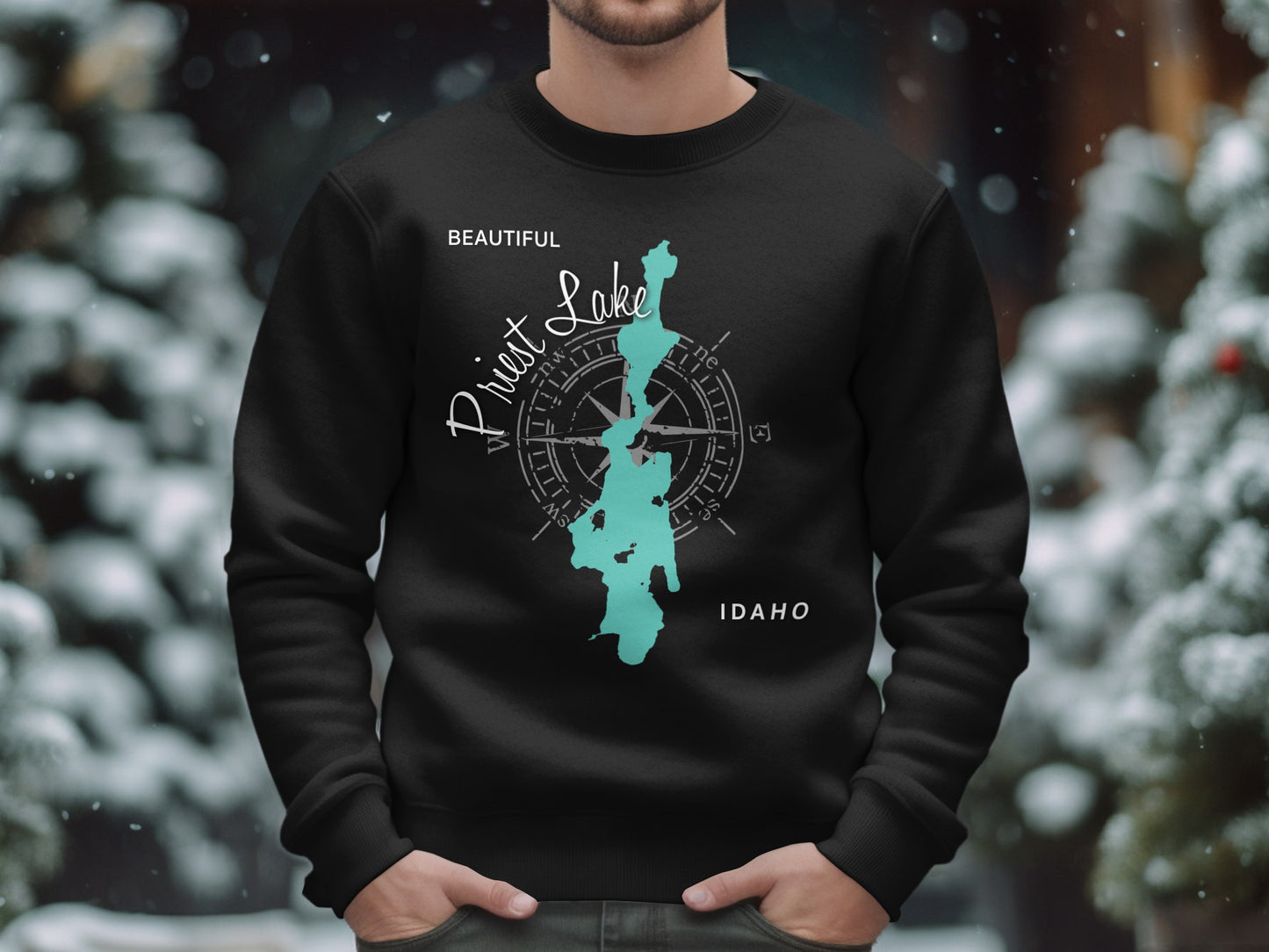 Black sweatshirt with a teal Priest Lake Idaho map and compass graphic.