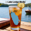 Glass of iced tea with a lemon slice and a blue lake map design.