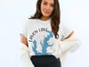 White t-shirt with "Lavon Lake Texas" graphic featuring a compass and lake silhouette.