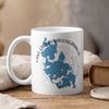 White mug with blue map of Lake Chargoggagoggmanchauggagoggchaubunagungamaugg, Massachusetts.