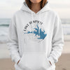 White hoodie with "Lake Rampart Colorado" text and map graphic over compass rose.