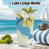 Glass of lemonade with Wisconsin map, mint, limes, on beach with sailboat.