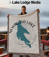 Throw blanket with Newfound Lake, New Hampshire map design and fringed edges.