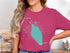 Woman wearing pink t-shirt with Lake Mohave Arizona map design.