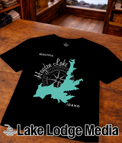Black t-shirt with teal map outline of Hayden Lake, Idaho and compass rose.