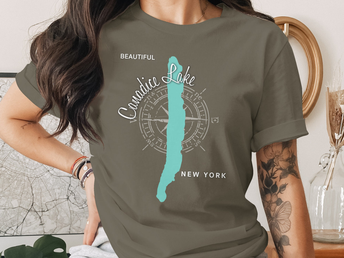Grey t-shirt with "Beautiful Canardice Lake New York" and compass graphic.