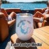 White stainless steel wine tumbler with Broadway Lake South Carolina graphic on a boat table.