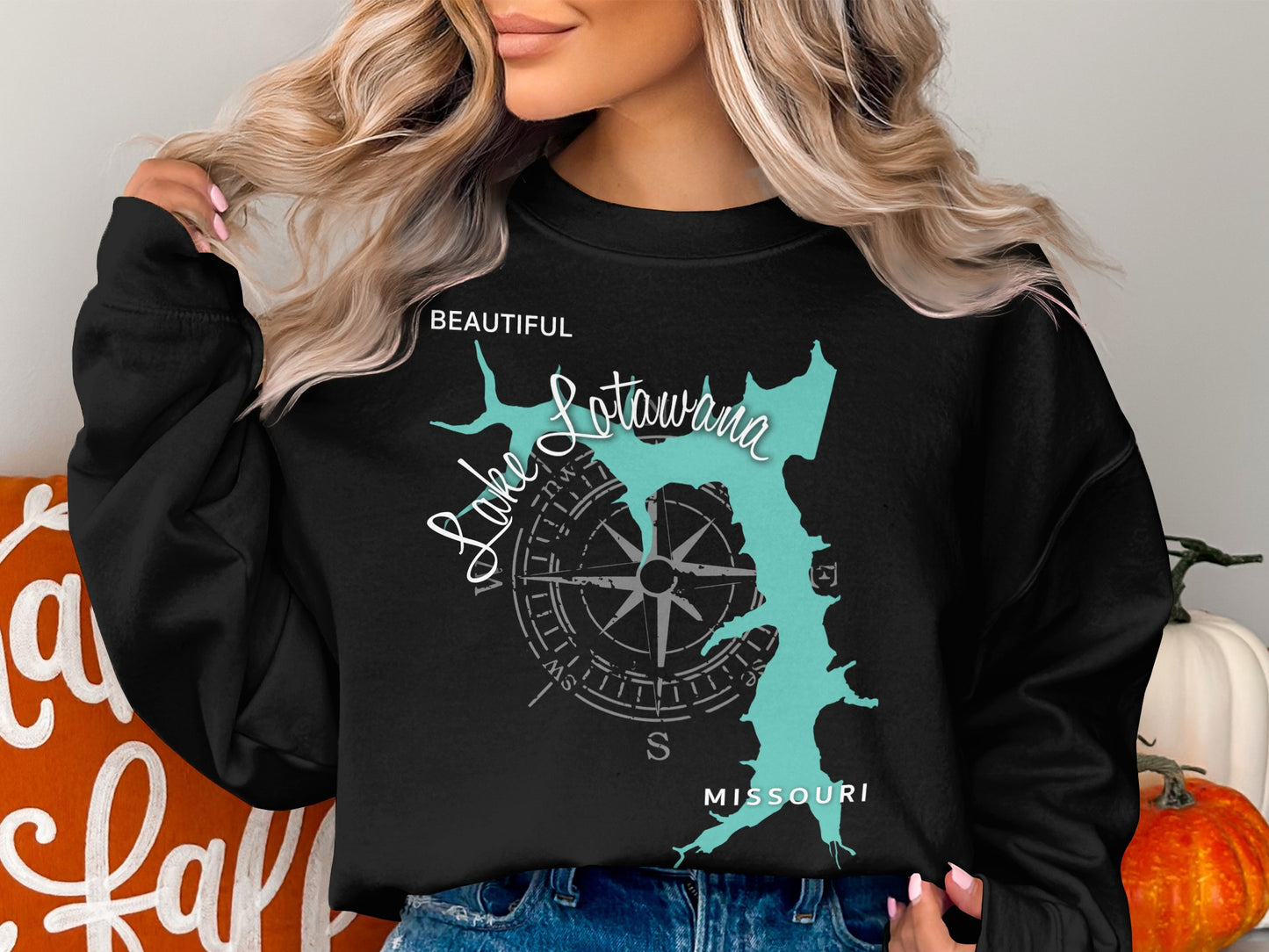 Black sweatshirt with a teal map of Lake of the Ozarks, Missouri.