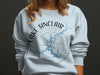 Light blue crewneck sweatshirt with "Lake Sinclair Georgia" text and a compass design.