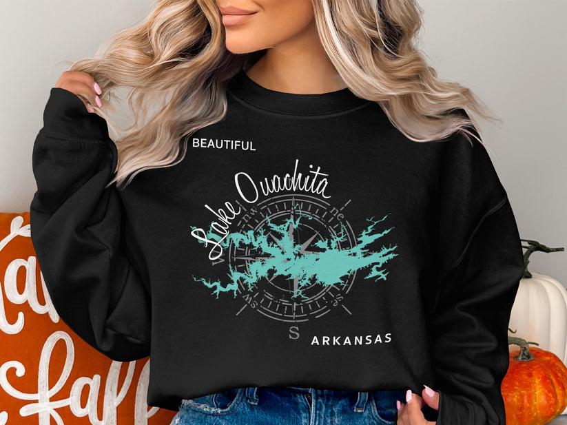 Black sweatshirt with "Lake Ouachita Arkansas" and compass graphic.