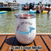 White insulated travel tumbler with a Lake Crescent Washington compass graphic, resting on a boat deck.