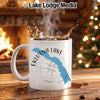 White mug with Eklutna Lake, Alaska design and compass graphic.