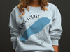 Light blue sweatshirt with a graphic of Lake Louise on a compass rose.
