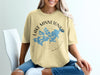 Yellow t-shirt with blue map of Lake Minnetonka and compass design.