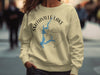 Light yellow crewneck sweatshirt with Smithville Lake, Missouri compass design.