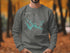 Grey sweatshirt with "Beautiful Tim's Ford Lake Tennessee" and compass graphic.