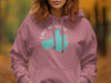 Pink hoodie with teal Lake Mendota Wisconsin graphic and compass rose.