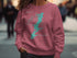Pink sweatshirt featuring a teal map of Oldahoma Lake with a compass rose.