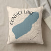 Convict Lake California map on a cream pillow with a gray blanket.