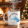 White mug with "Lake Rampart Colorado" design, steaming coffee splashing.