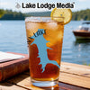 Glass with iced tea, lemon, and blue lake outline graphic.