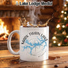 White mug with Mark Twain Lake, Missouri design, splashing coffee.