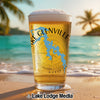 Glass of beer with Lake Glenville map graphic on a tropical beach.