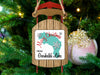 Sled-shaped ornament with "Merry Christmas From Garibaldi Lake" text.