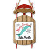 Christmas ornament shaped like a red sled with a wooden center reading "Merry Christmas from Lake Marble".