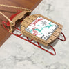 Wooden sled ornament with red runners features "Merry Christmas" and Lake Dardanelle graphic.