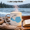 White mug with Glen Lake Michigan map and compass design.