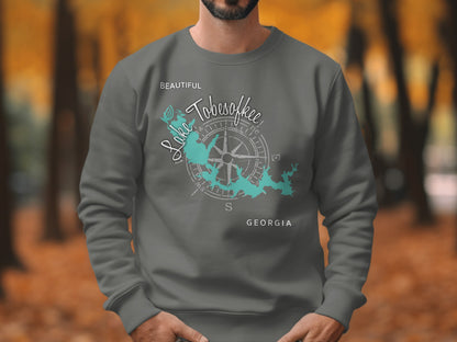 Gray sweatshirt with a teal compass and Lake Tobesofkee map design.