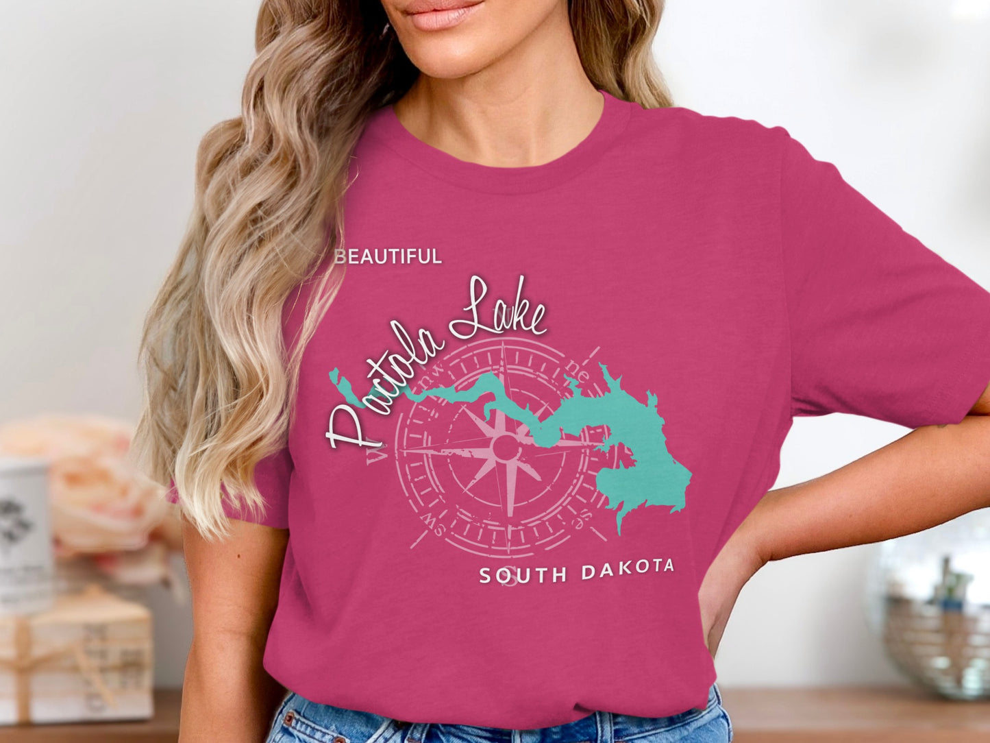 Pink t-shirt with Patoka Lake compass and South Dakota map graphic.