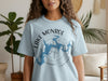 Light blue t-shirt with Lake Monroe Indiana compass map graphic.