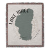 Woven blanket with Lake Tahoe map outline, compass rose, and text "Lake Tahoe California".